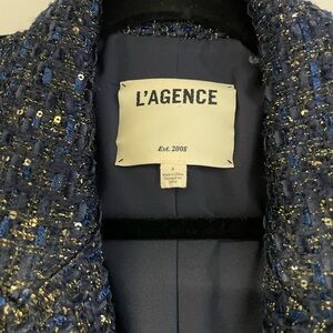 Gorgeous gold metallic in a tweed blue blazer.